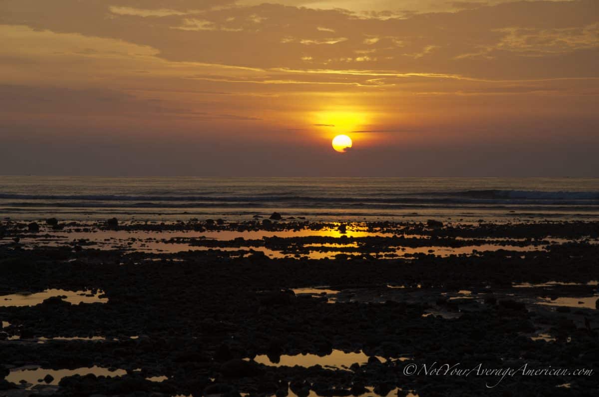 Sunset in front of the rocky beach in front of Chirije, Manabi, Ecuador | ©Angela Drake