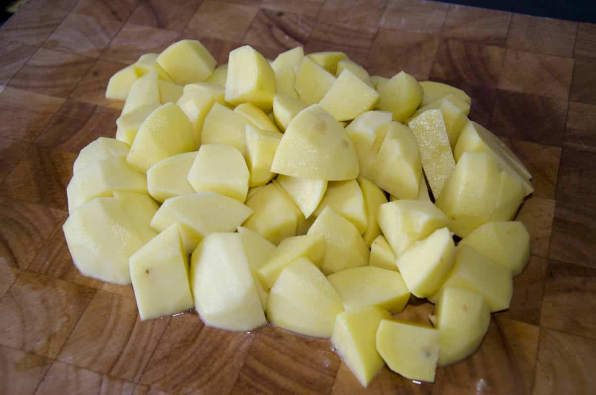 Peel and chop the potatoes.