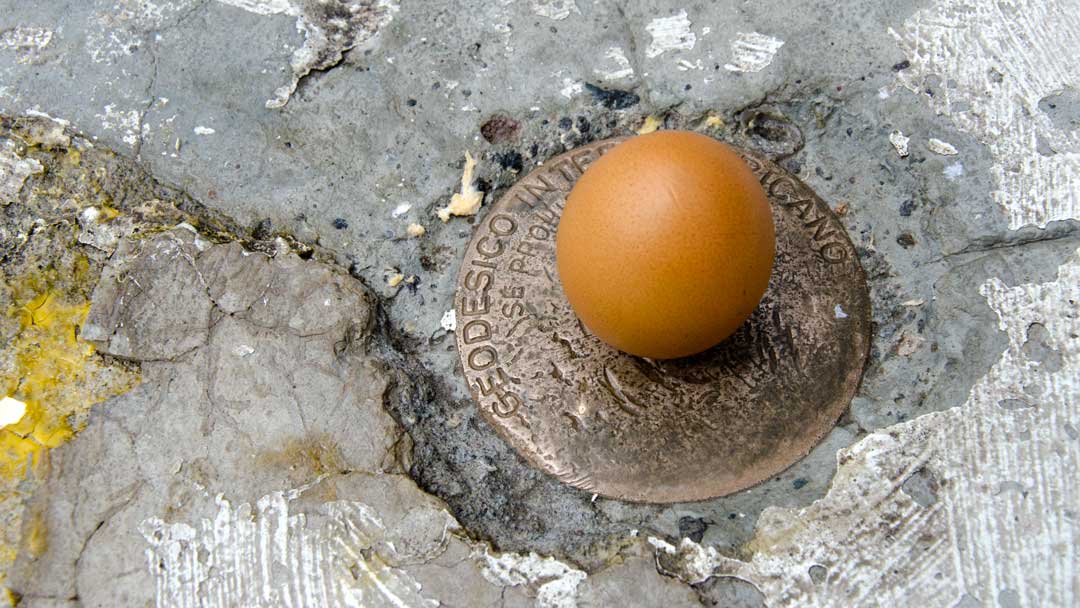 A Balanced Egg at the authentic Mitad del Mundo; Buena Esperanza, Cayambe, Ecuador | ©Angela Drake A Balanced Egg at the authentic Mitad del Mundo; Buena Esperanza, Cayambe, Ecuador | ©Angela Drake