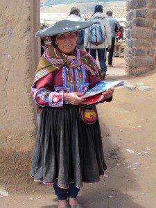 A local woman handing out tourist guides.