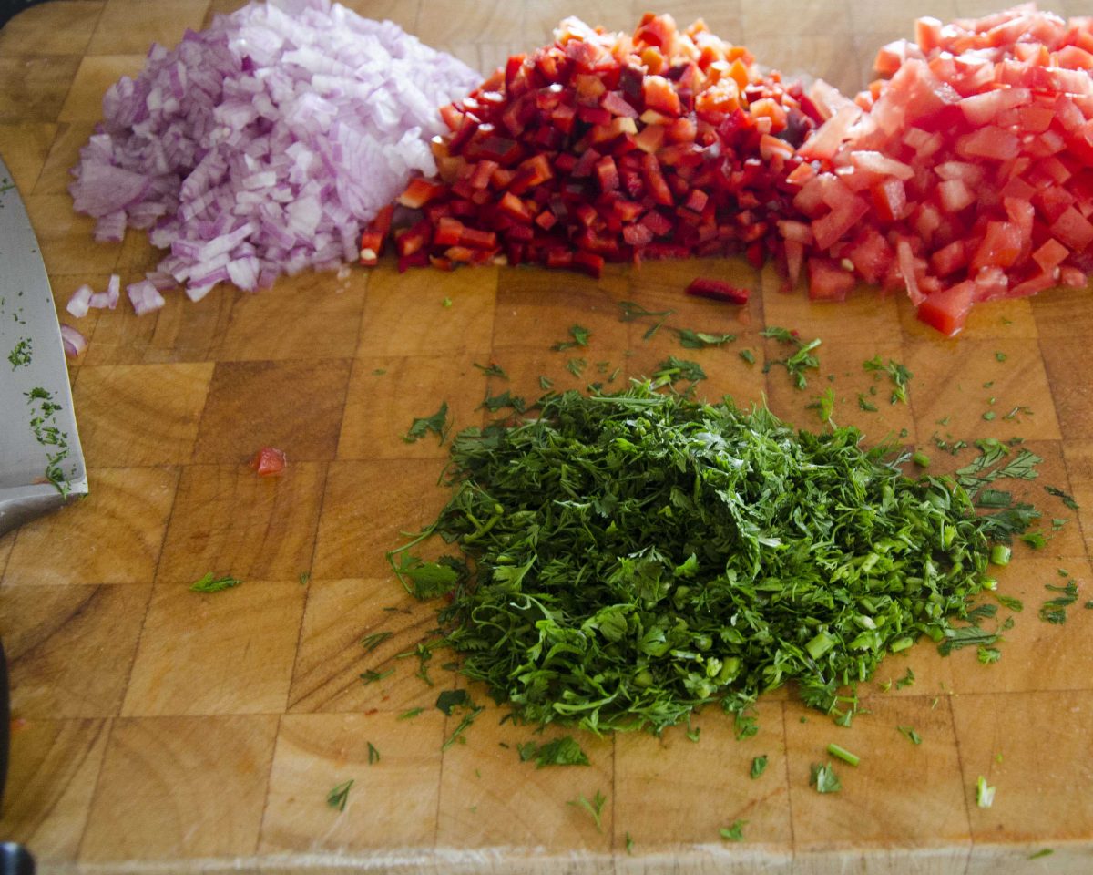 Diced onions, peppers, tomatoes, and cilantro for our vegetarian ceviche