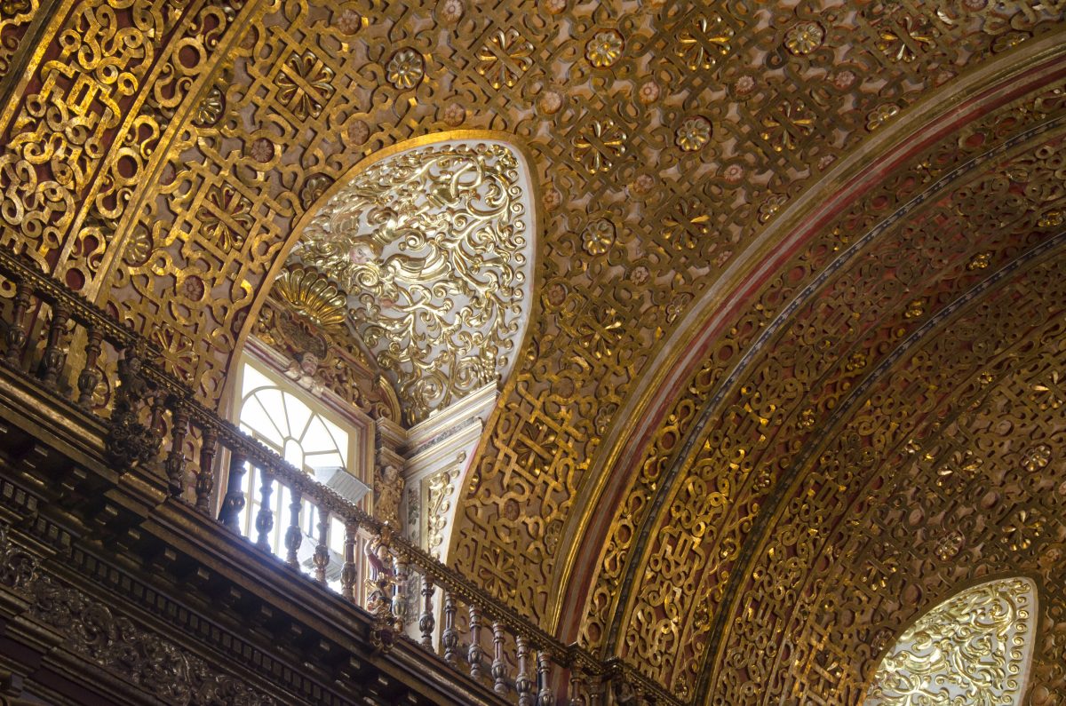 A small window in the higher reaches of the church allows light to reflect of the gold leaf ceiling