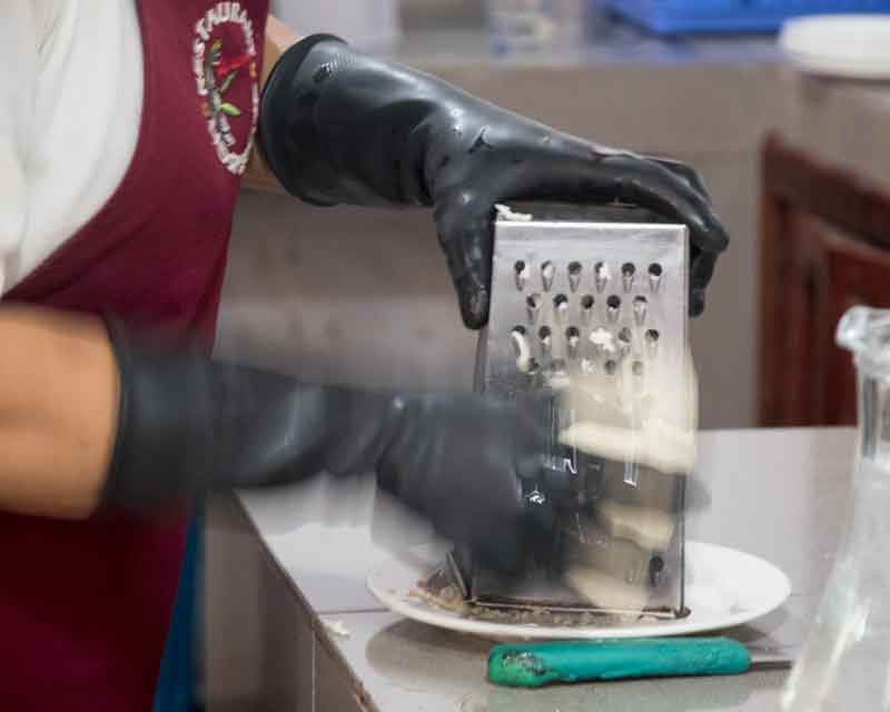 Grate the cheese; recipe for tigrillo.