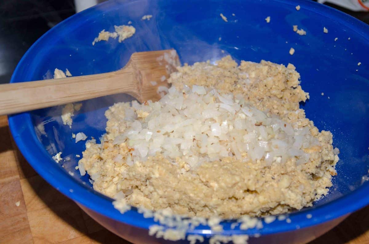 Add onion and garlic; recipe for Bolón de Verde