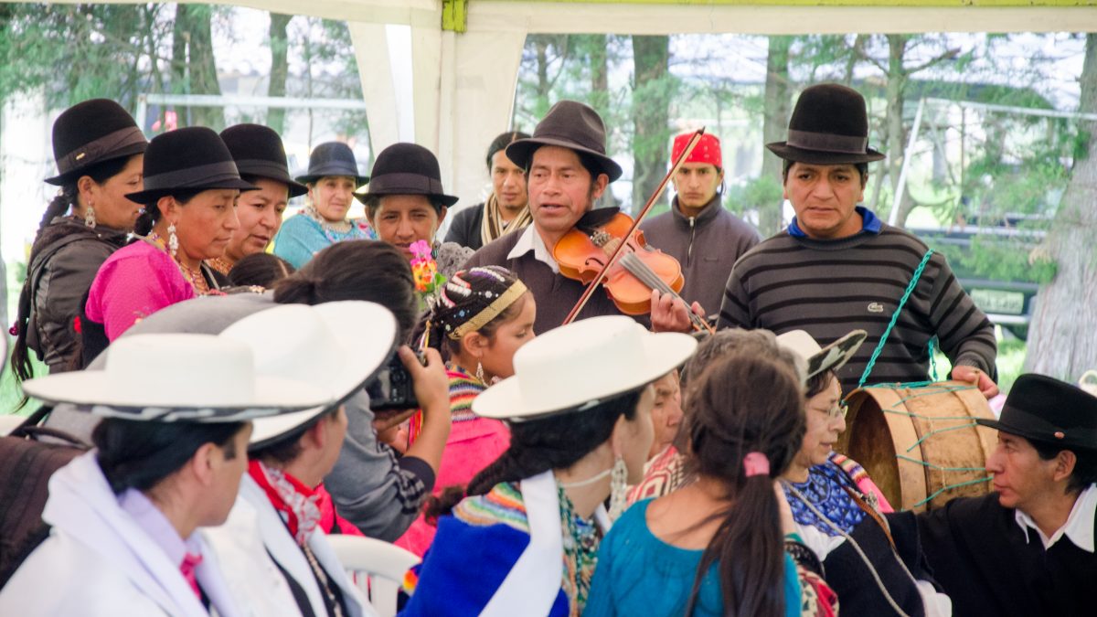 The Saraguro Council watches the band play at Kapak Raymi, Quito, Ecuador | ©Angela Drake / Not Your Average American