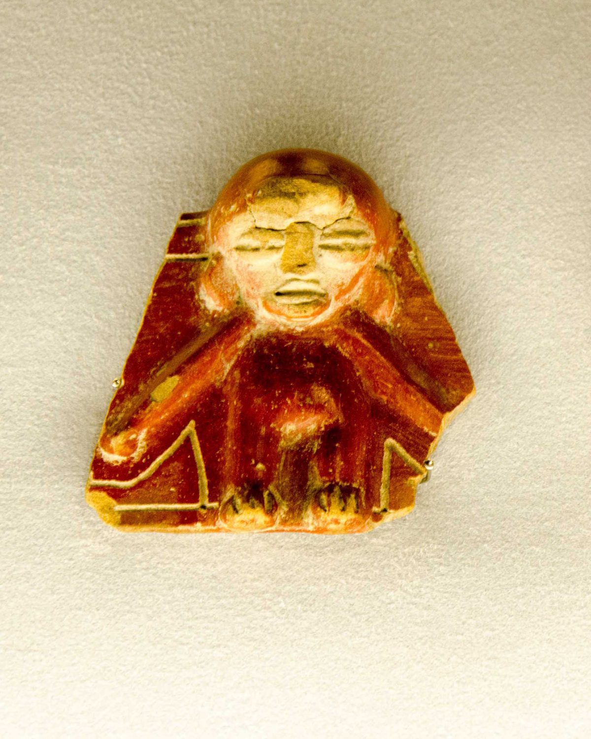 A pottery fragment of displayed at the Weilbauer Museum, La Catolica (PUCE), Quito, Ecuador