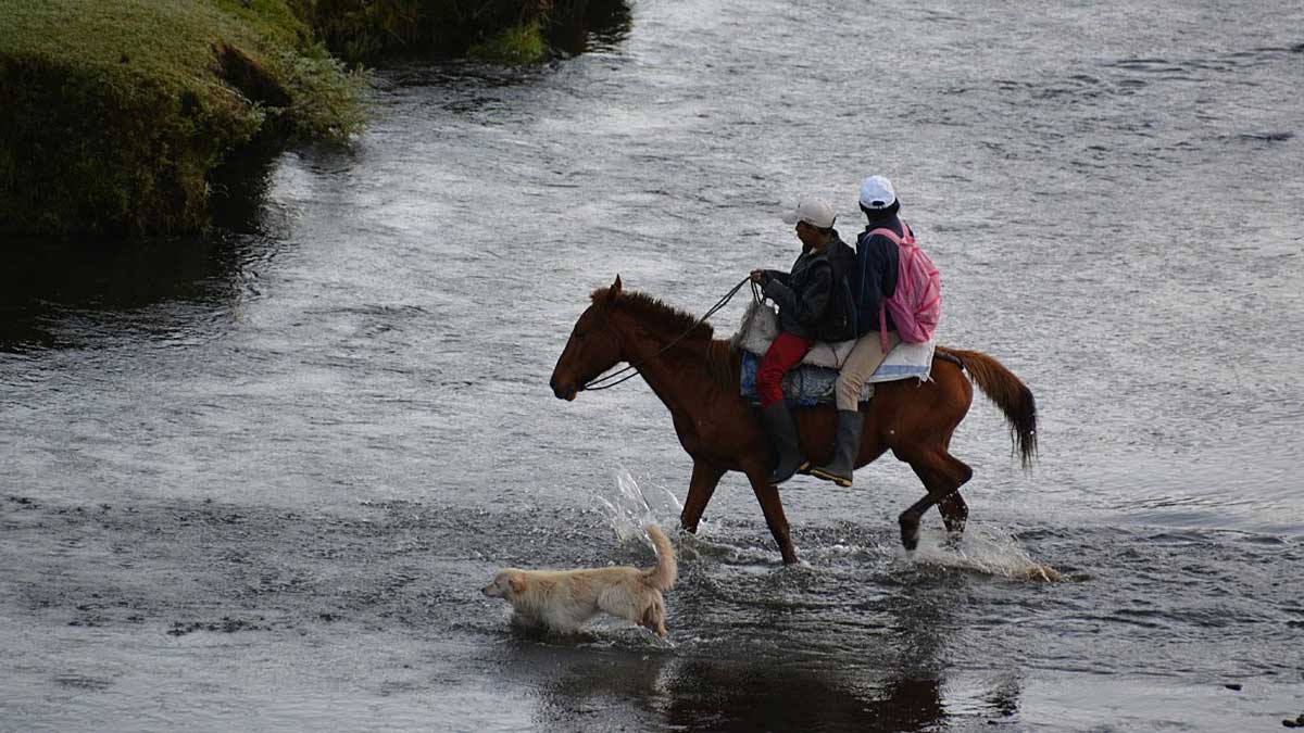 Crossing the River, Piñan, Ecuador | photo credit: David Sasaki