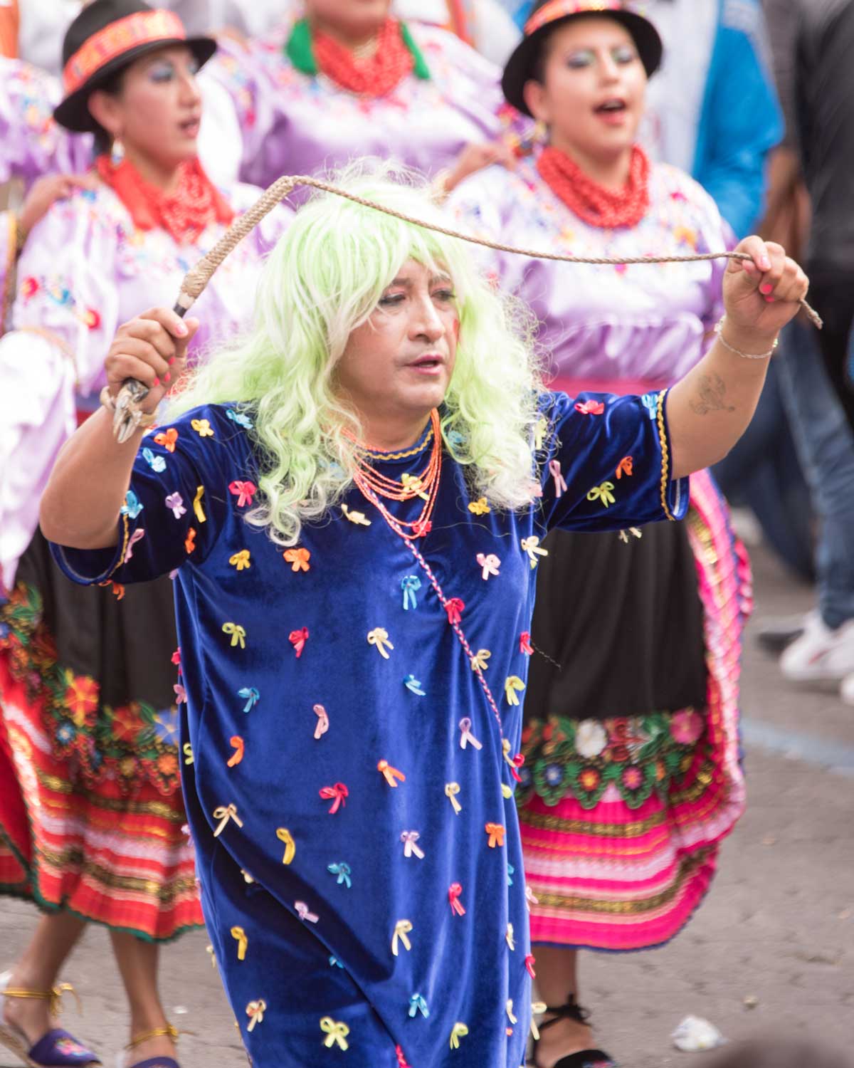 Una Camisona with Whip, Mama Negra, Latacunga, Ecuador | ©Angela Drake