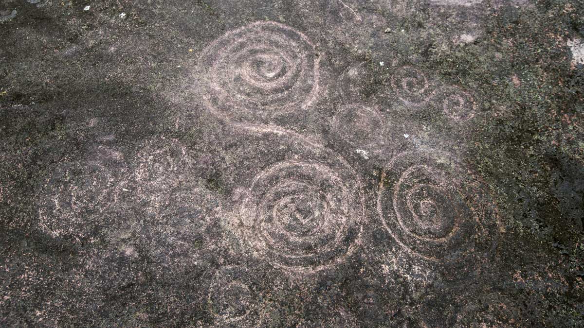 Spiral Petroglyphs in Guizhaguiña, Cascada Plano Rumi, Ecuador | ©Angela Drake