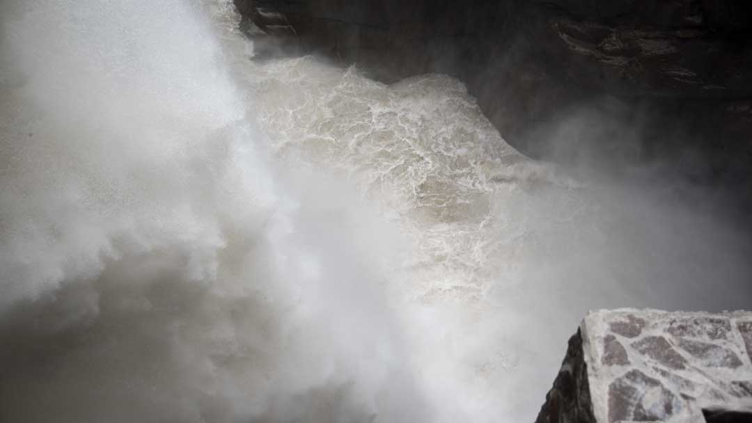 Water pouring into the Devil's Cauldron, (Pailon del Diablo), Rio Verde, Ecuador | ©Angela Drake
