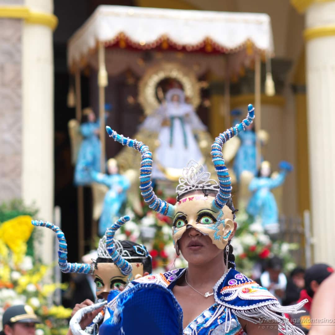 China Diablada with the Virgin of Candelaria in the background