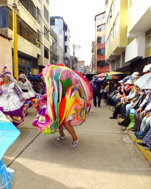 Waca waca, a woman, brings up to twelve brightly colored skirts