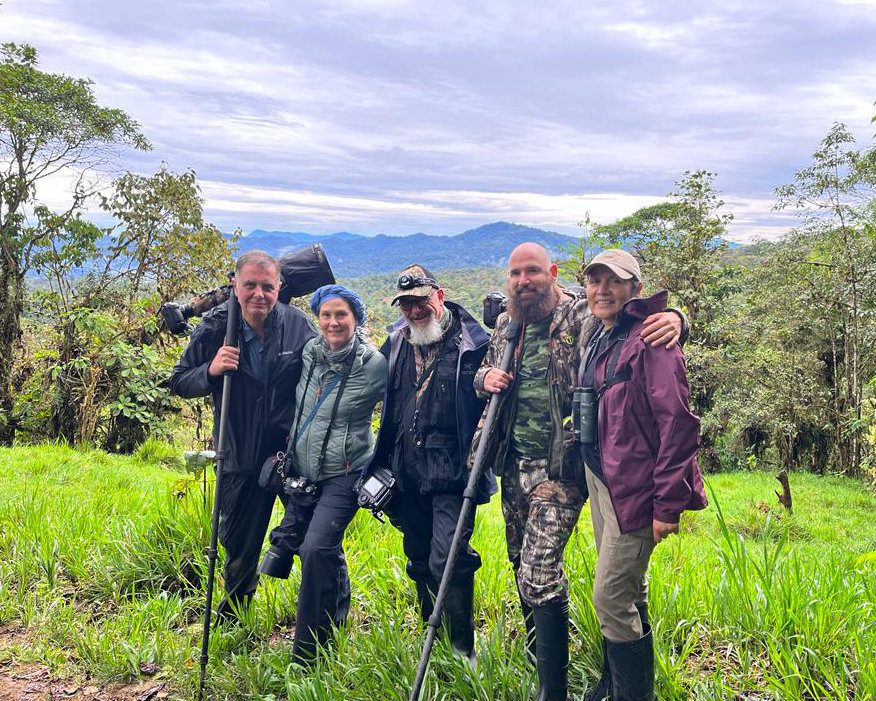 Julia Patiño and several clients pose for a photo