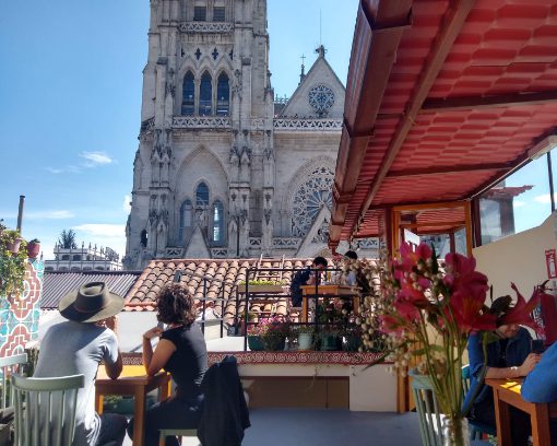 The view from the upstairs patio at Alma Quiteña includes the Basilica del Voto Nacional directly across the way