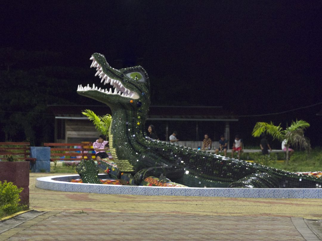 A Black Caiman in mosaic form at the Limoncocha park and playground