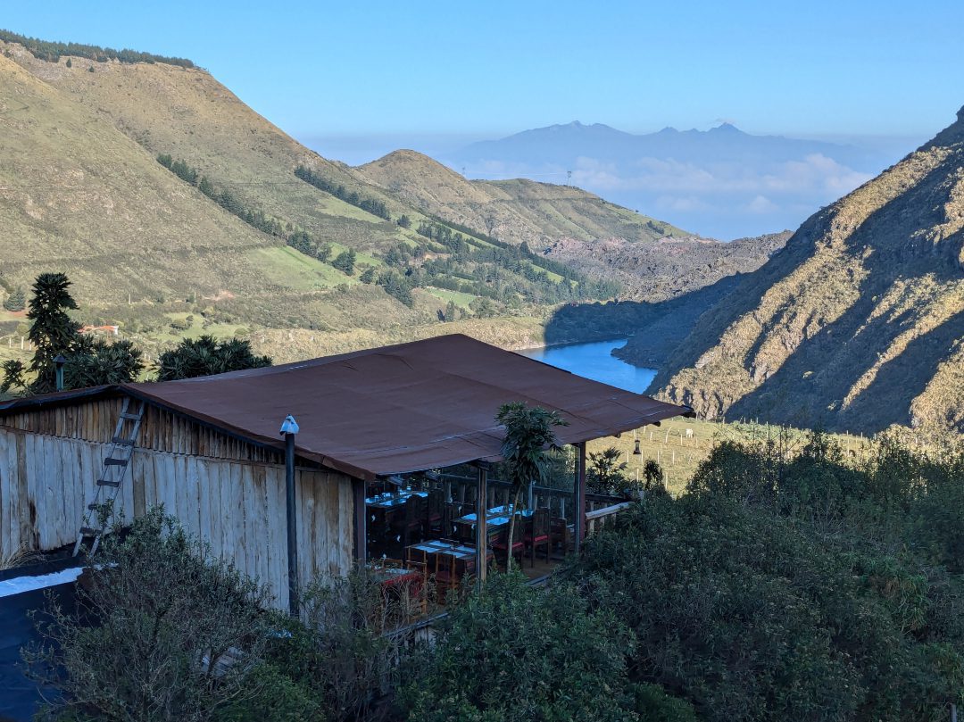 Looking over the rooftop of Tambo Condor's dining room towards the Pichincha Volcano