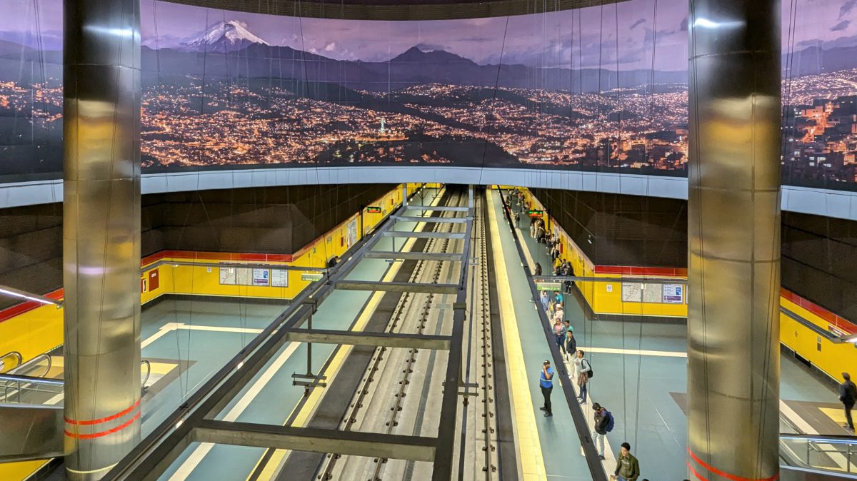 Panorama of Quito and Cotopaxi above the Metro train lines at the Iñaquito's Station in Quito, Ecuador