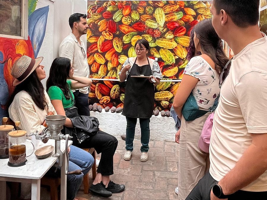 Jhoana leads a chocolate tasting experieece at Cuenca's Cacao Museum