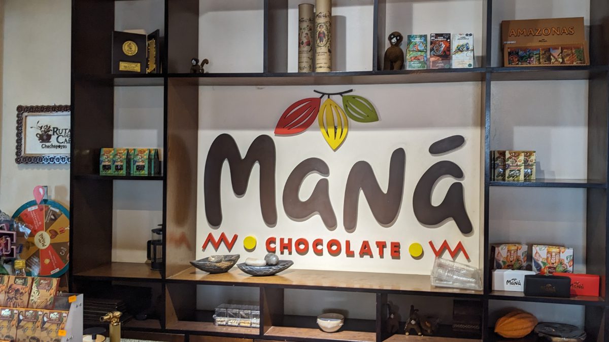 The entry way at Maná Coffee and Chocolate is a book case full of intriguing items.