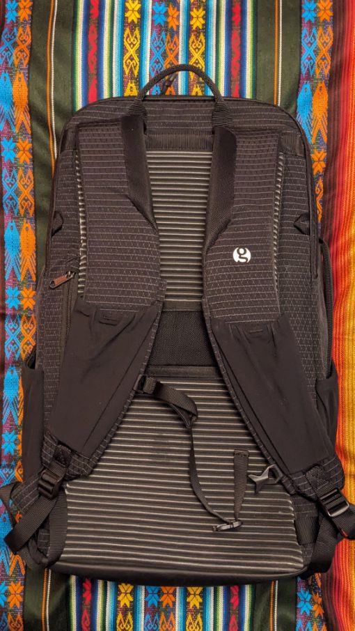 Back of the Gossamer Gear Aero Jet lightweight, carry-on backpack (mud from Gocta Falls trip)