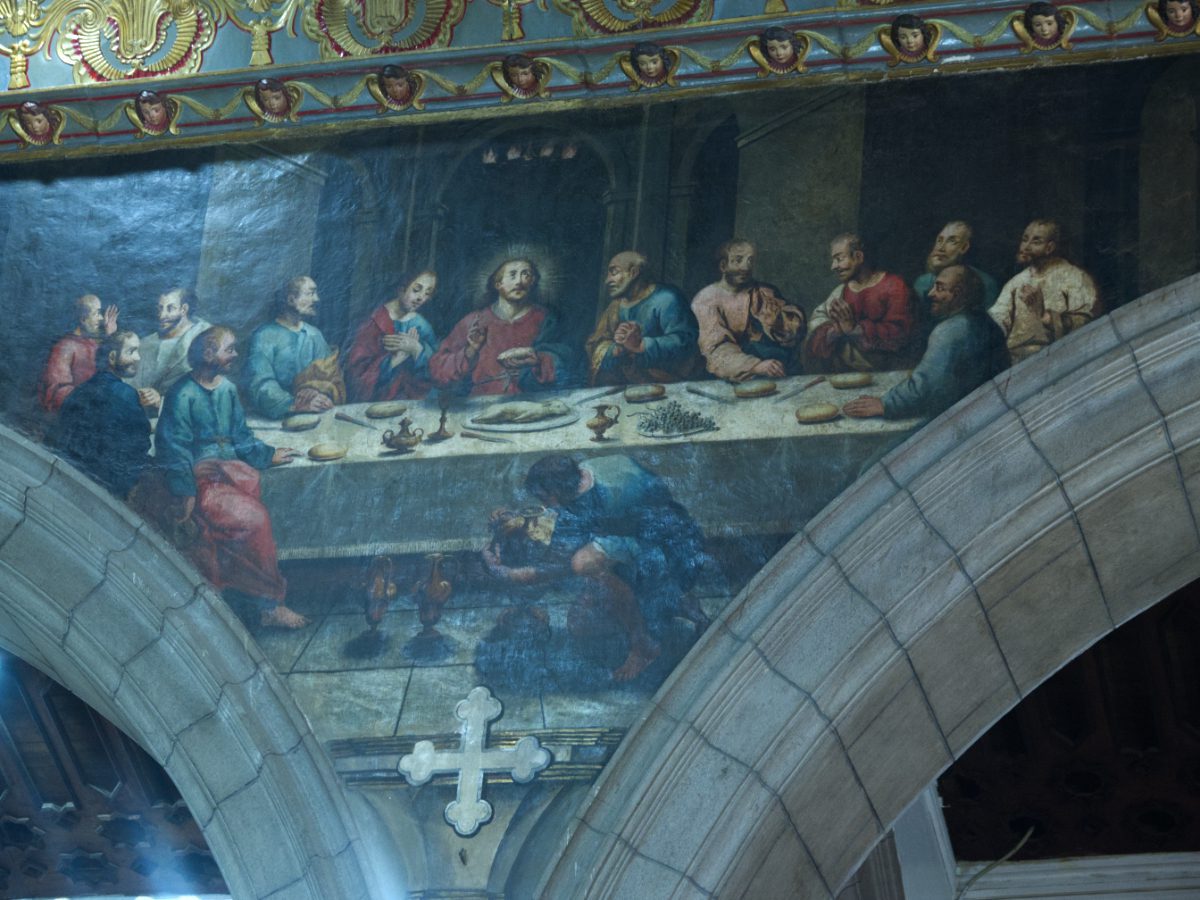 High about the arches in the Quito Metropolitan Cathedral is a this mural of the Last Supper, possibly with a guinea pig on the plate.